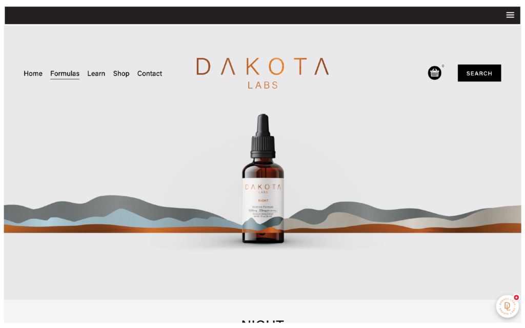 Dakota Labs website design on screens