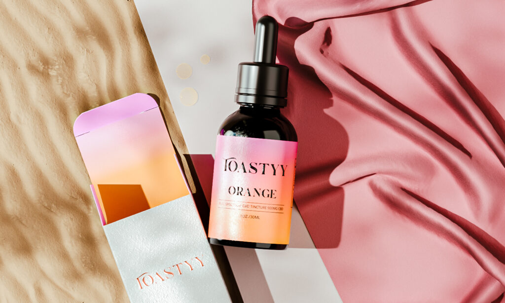 Toastyy CBD products top view on pink fabric